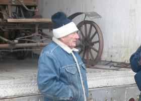 Homer Edmiston, with rusty car, detail